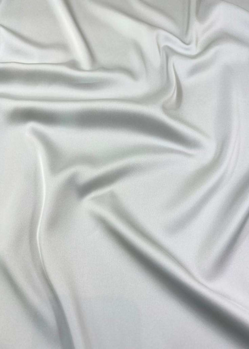 a white fabric with folds