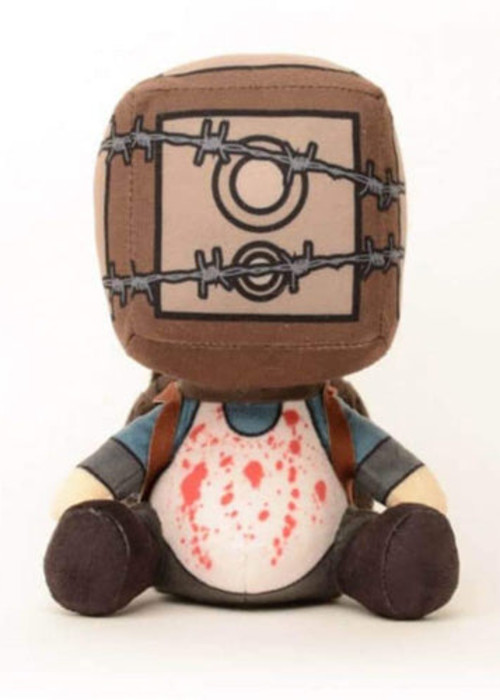 a stuffed toy with a barbed wire head