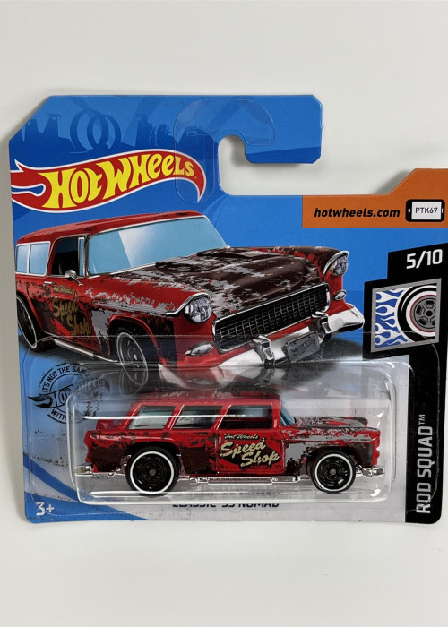 a red toy car in a package