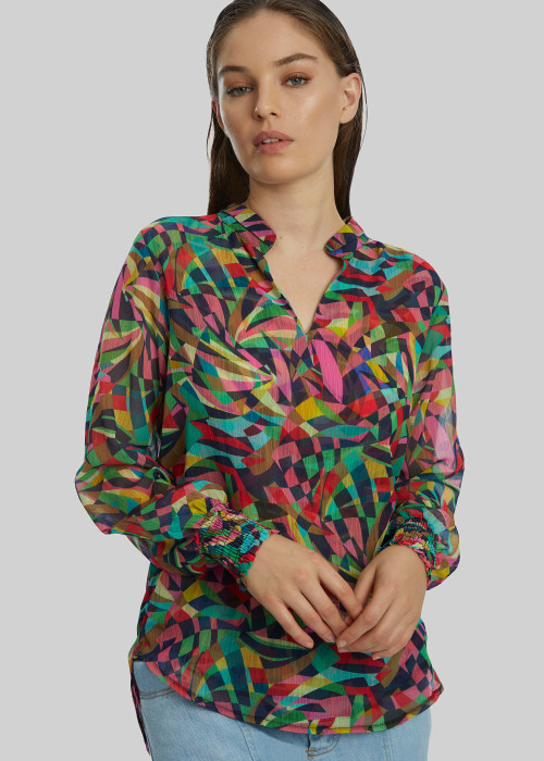 a woman in a colorful shirt