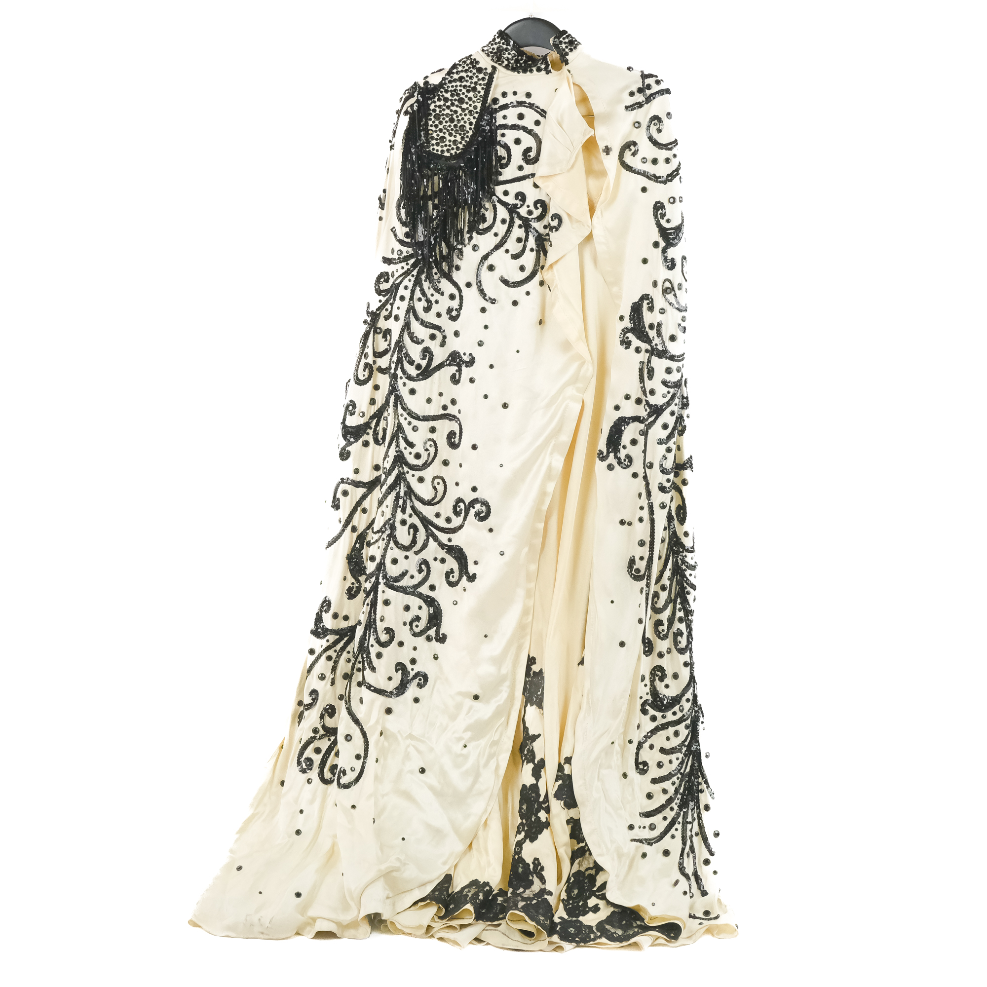 Sheila E.'s White Cape with Black Adornments/Lace