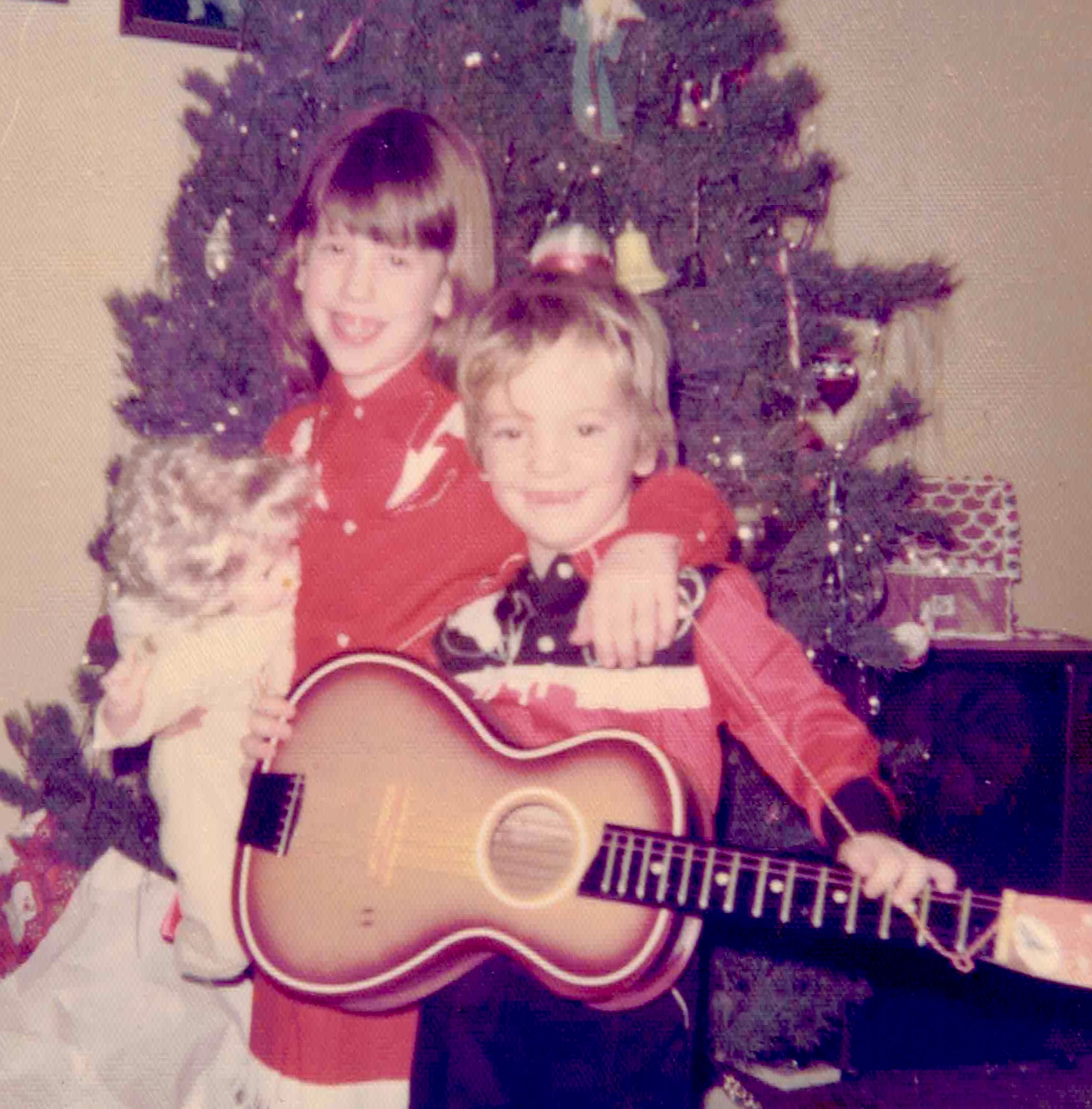John Woodland with his sister and first guitar, Christmas 1976