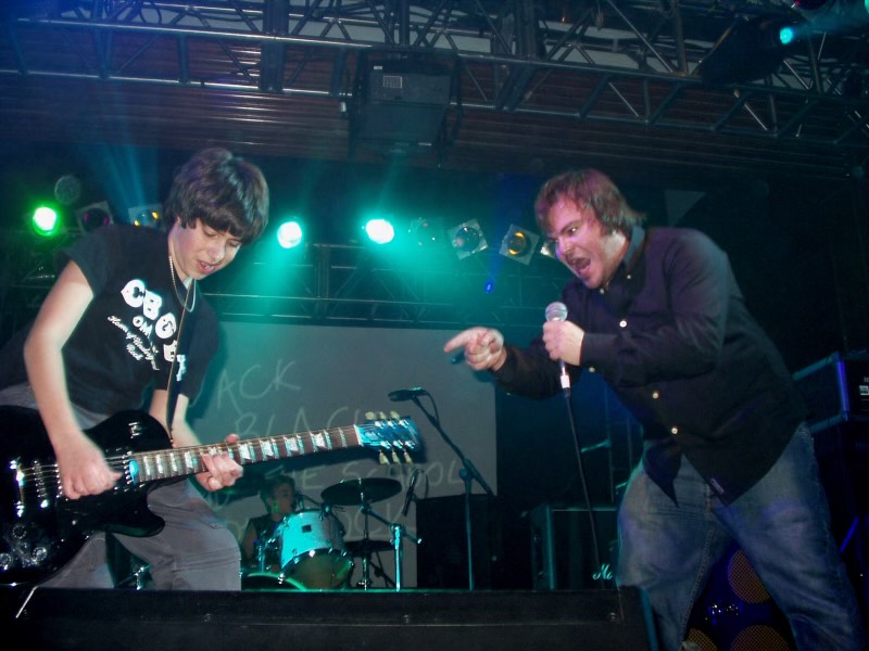 Joey Gaydos, Jr. and Jack Black perform at the UK premiere of School of Rock in January 2004..