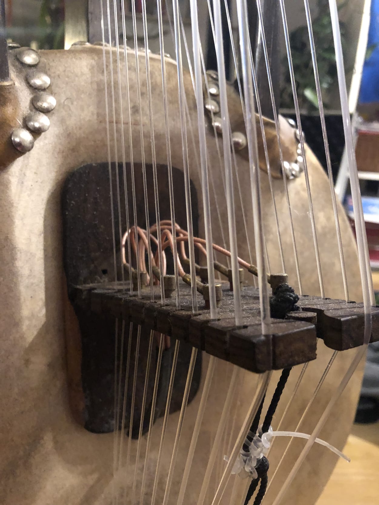 A close-up look at the kora's strings and bridge.