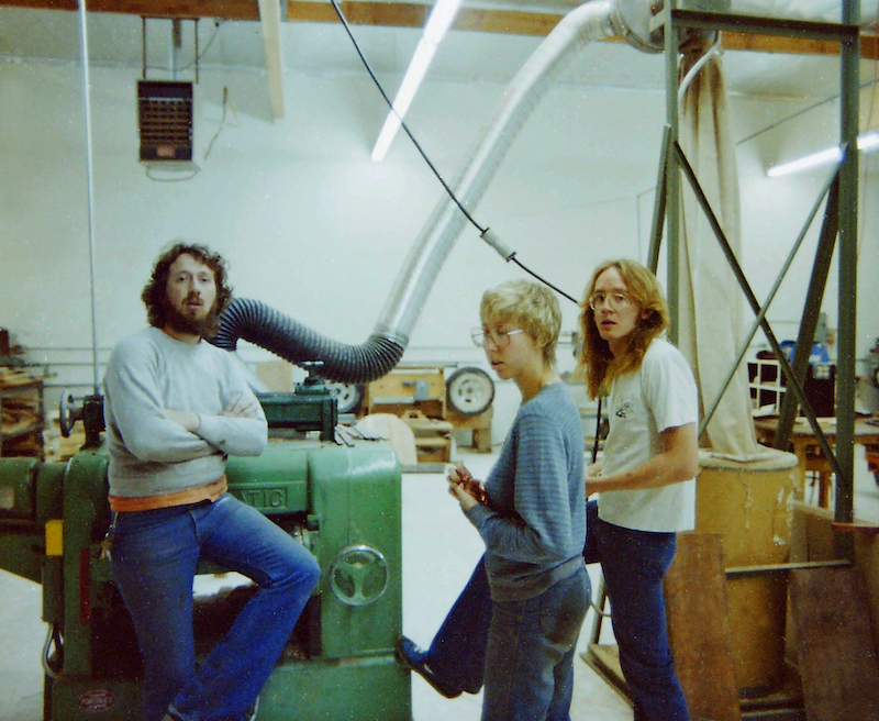 Grover Jackson, JoAnn Pieroth, Mike Eldred standing in the Charvel/Jackson workshop.