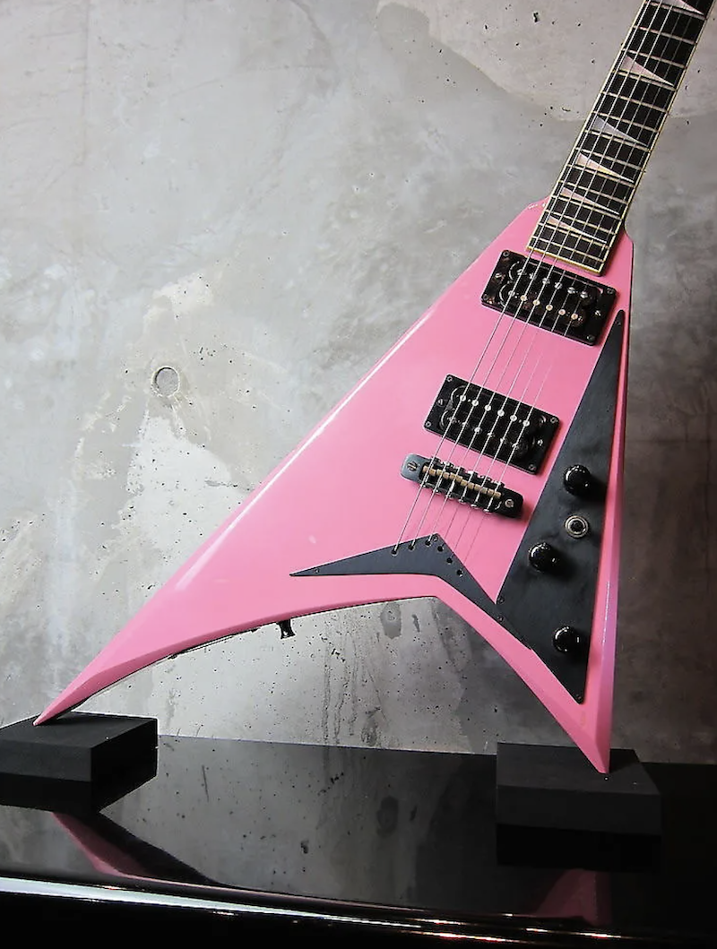 Closeup of pink Rhoads guitar