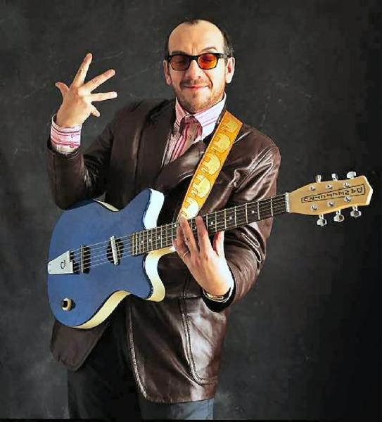 Elvis Costello with a Danelectro.