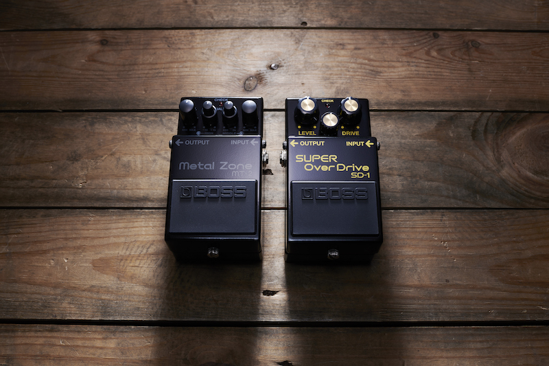 SD-1 and MT-2 anniversary editions side by side on a wooden table