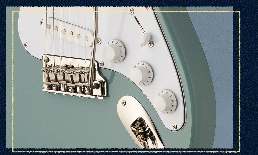 Closeup of PRS SE Silver Sky neck knobs