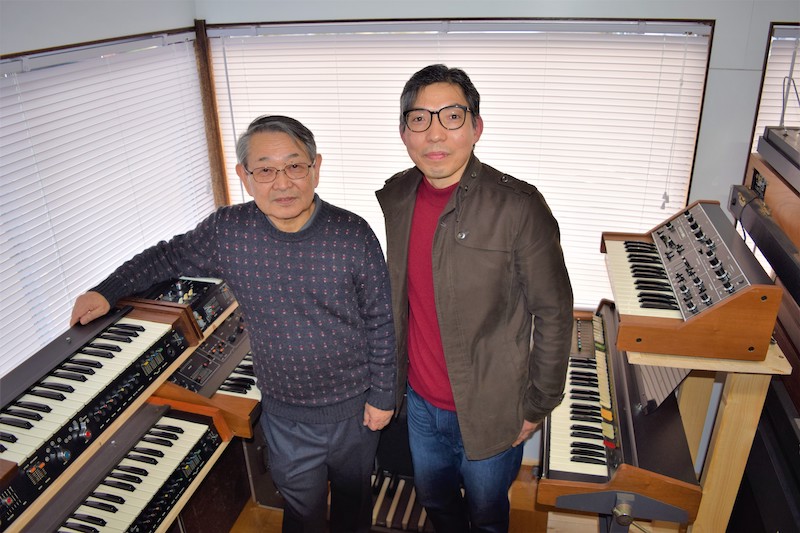 Museum head Hideki Ishikawa with longtime Korg engineer Mieda Fumio at the museum in 2017.