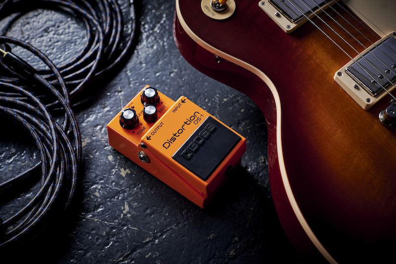 boss ds-1w next to a guitar