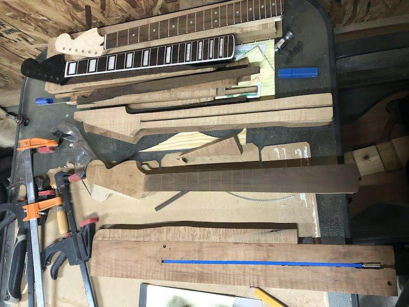 unfinished neck with exposed truss rod