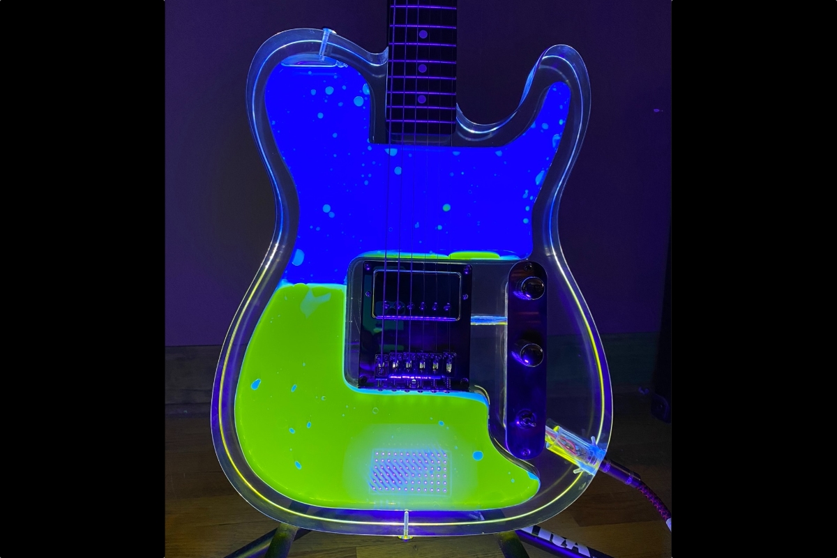 A Wavecaster with illuminated blue and green liquid.