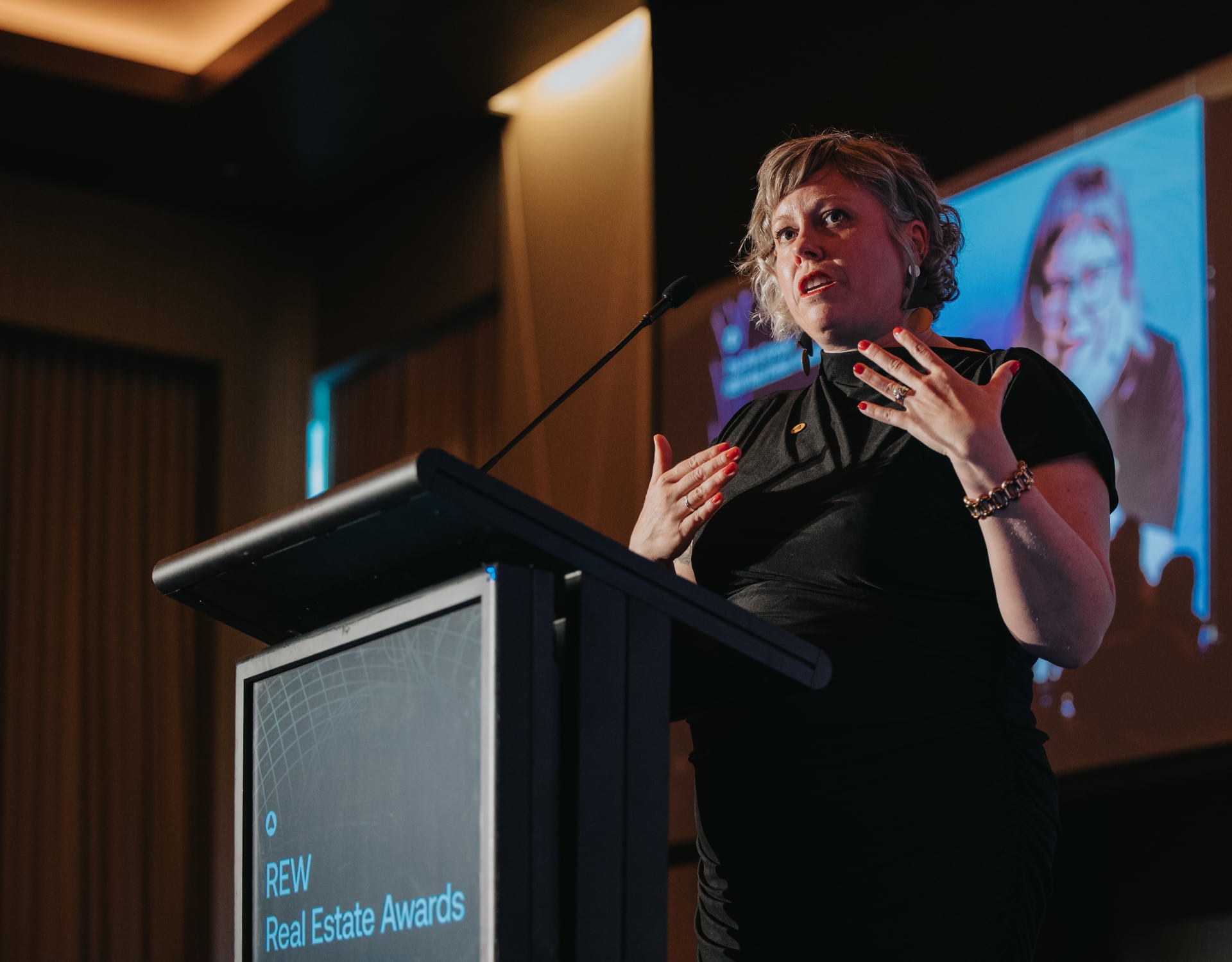 Erin Best presented the Brokerage Excellence Spotlight Award to Oakwyn Realty's Downtown Headquarters.