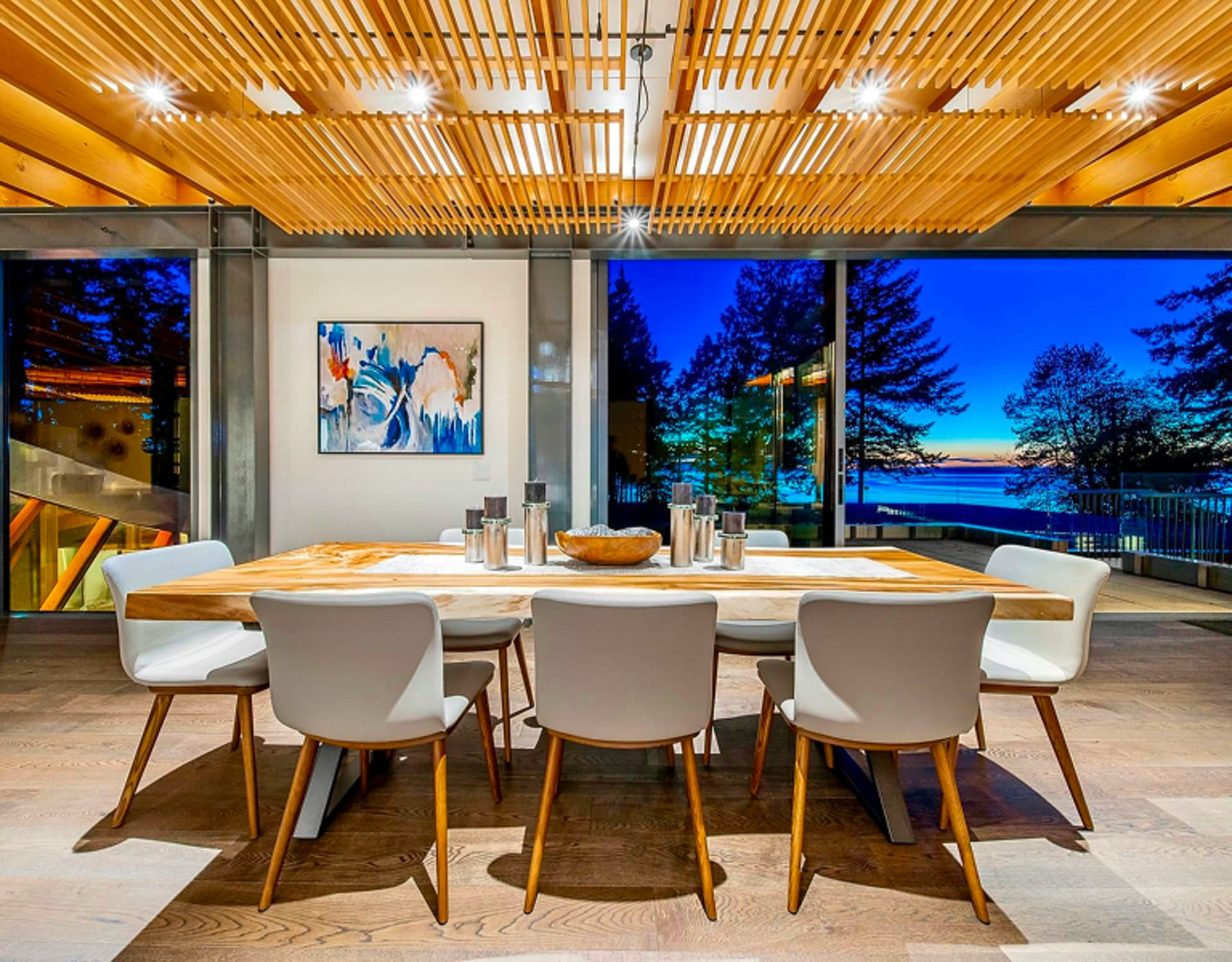 A stunning dining room with a wooden table and chairs.