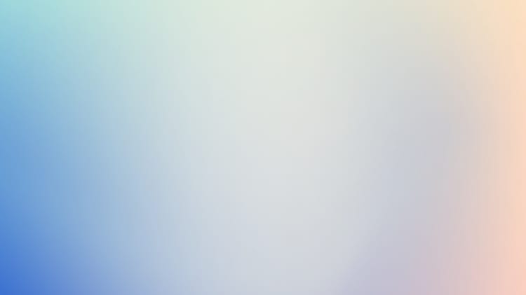 A soft, gradual gradient of blue and pink hues fills the frame, creating a serene and calming visual effect.