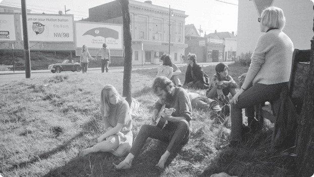 Kitsilano was once home to a counter-cultural community, some of whom can be seen here gathering outside in the spring of 1967.