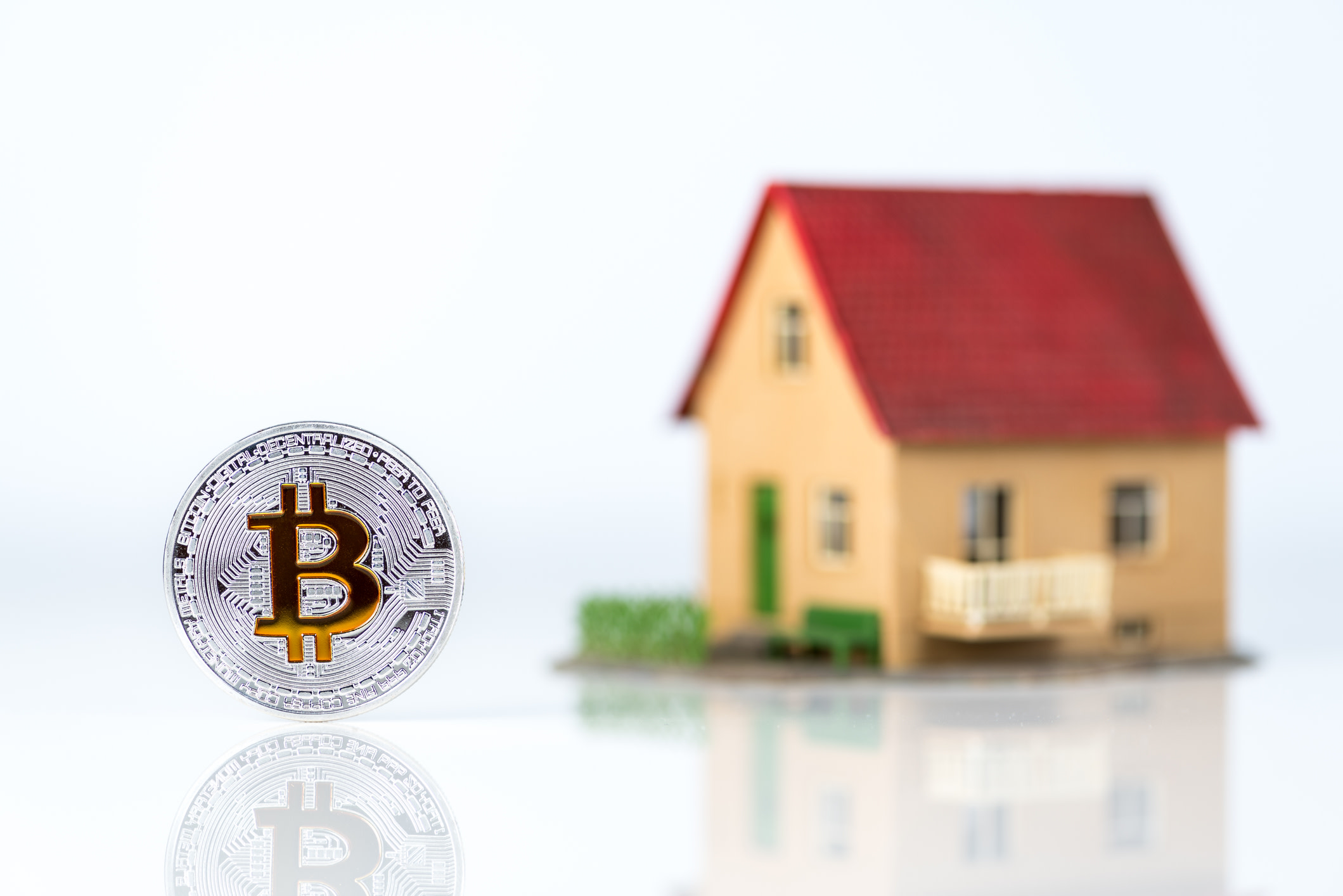 Can you buy a house with bitcoin cheap