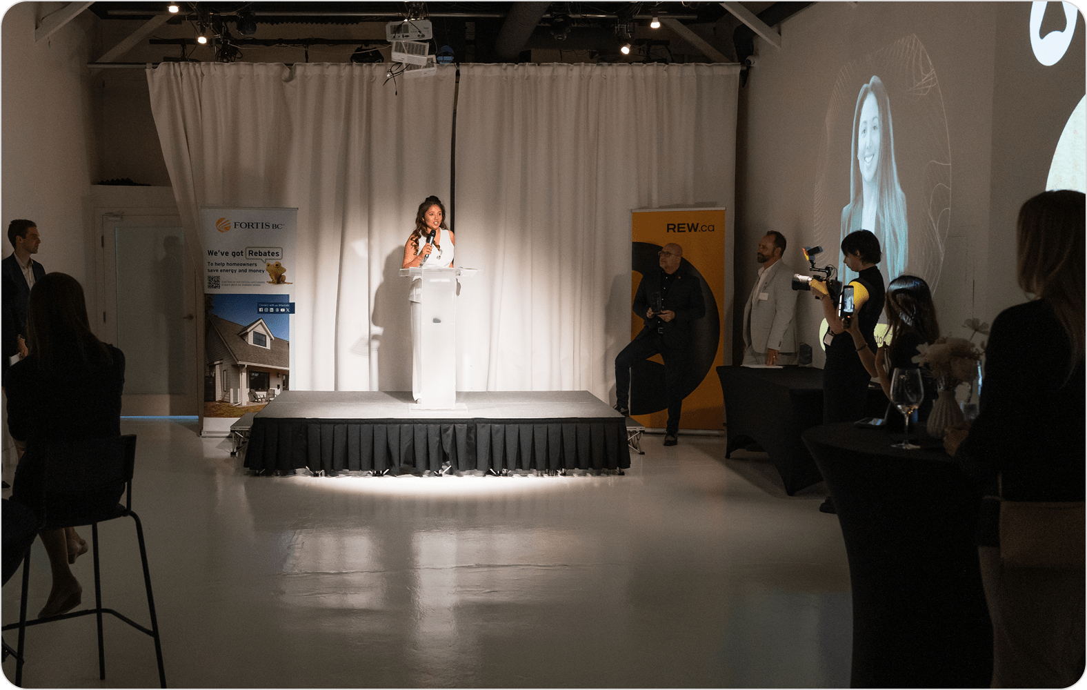 Jovita Pinto, winner of the 2025 Future Icon of Real Estate Award, speaking on stage.