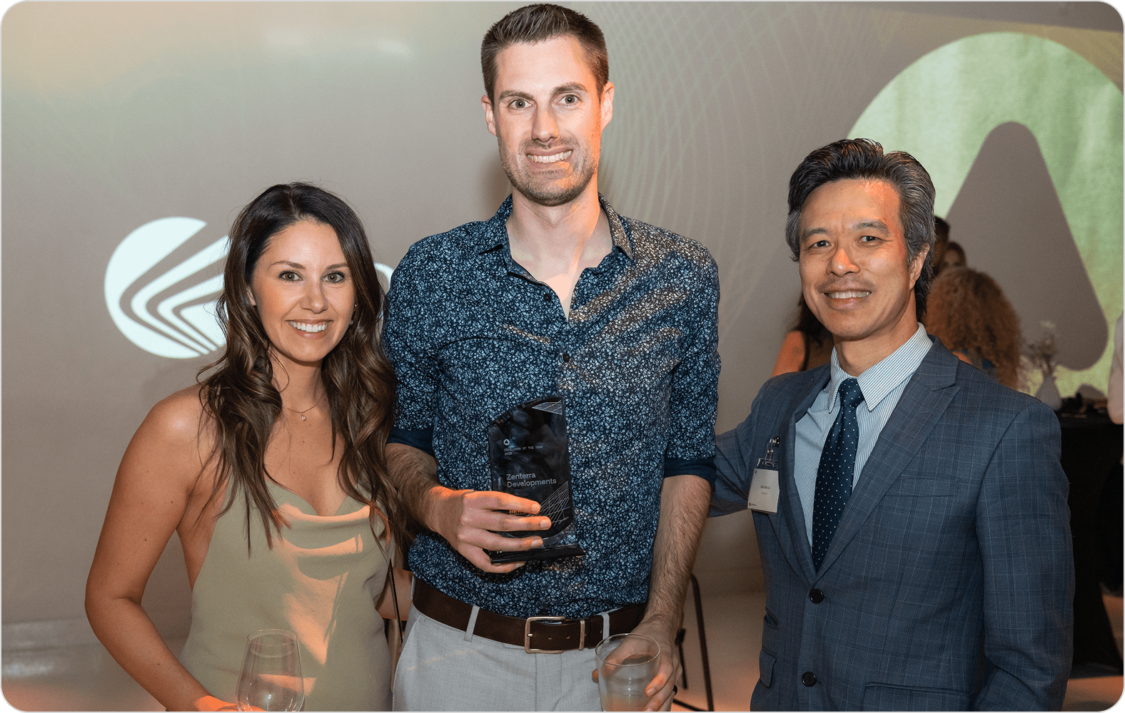 Deanne Millington and Derek Fenton of Zenterra Developments, with Michael Liu of FortisBC.