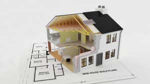 House model on paper house plan
