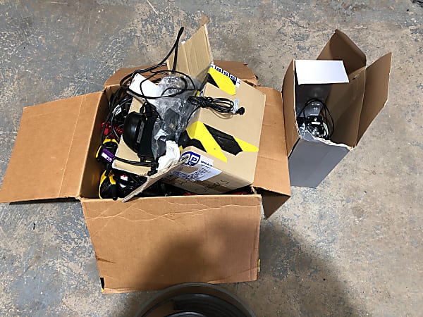 Box of radios and chargers. 