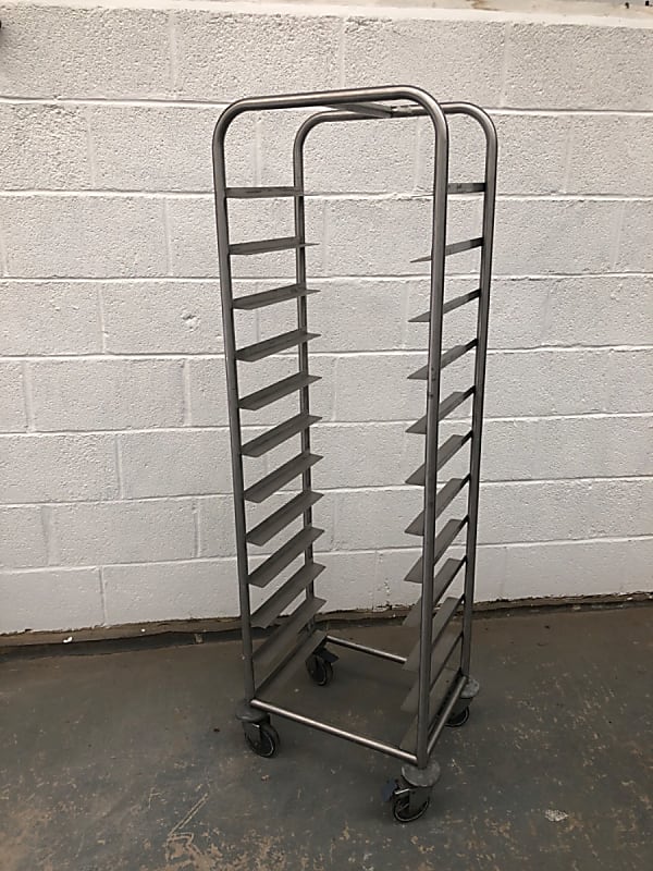 Tray trolley on lockable wheels