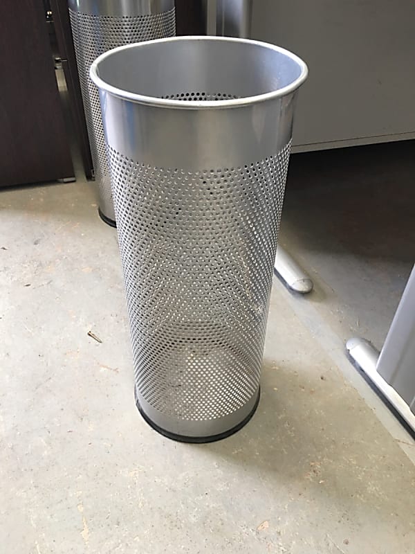 Tall perforated rubbish bin