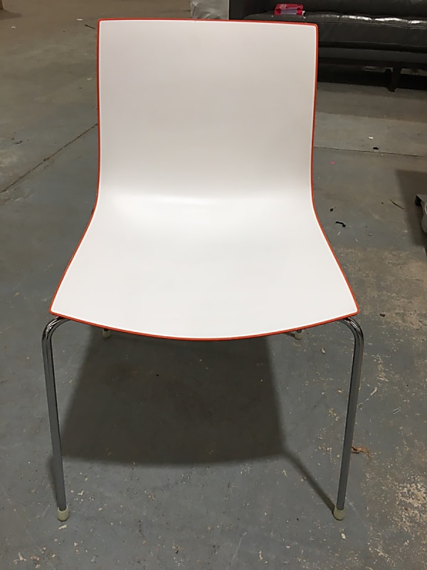 Arper waiting room chair with orange trim