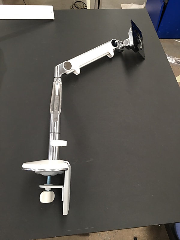 Human scale monitor arm