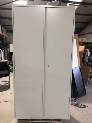 White metal wardrobe storage cupboard cabinet - no shelves. 