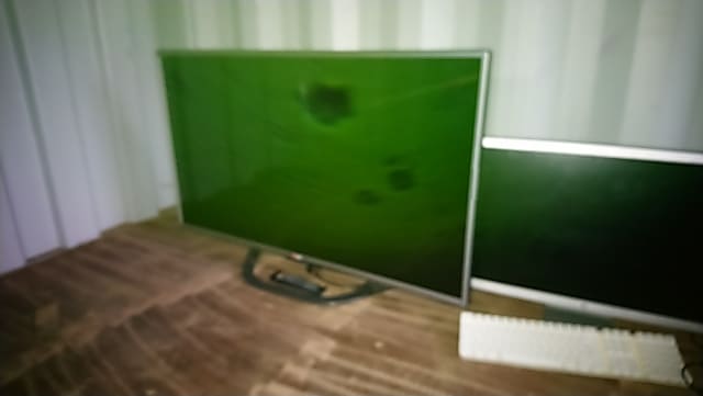 two black flat screen computer monitors