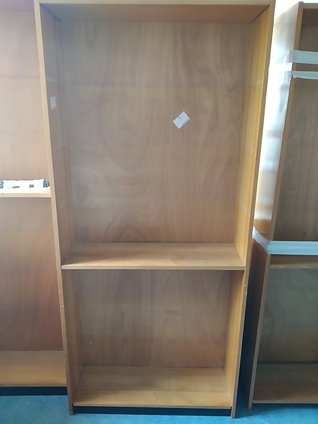 Wooden bookcase with shelves