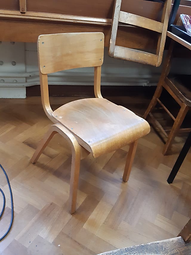 Vintage wooden chapel chair