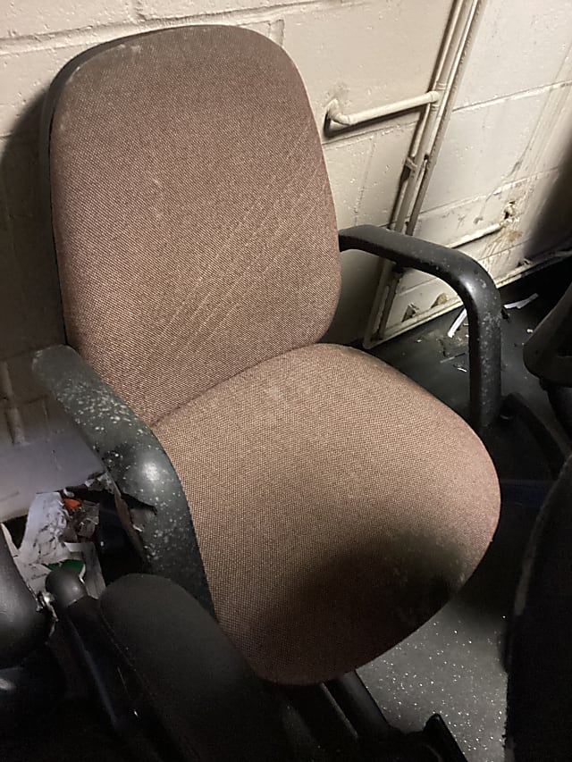 Brown operator chair