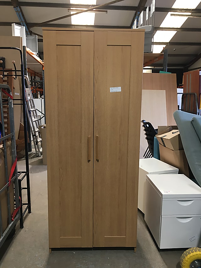 Tall pine or oak wardrobe