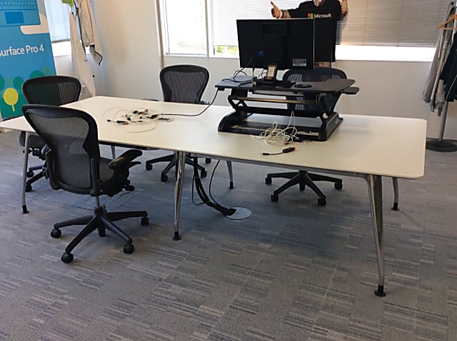 Large meeting table with power units