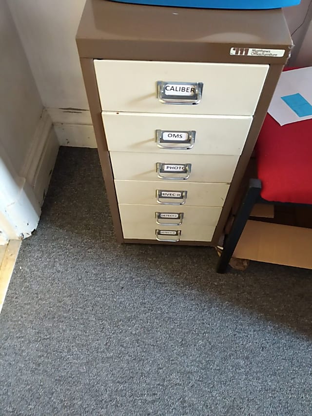 white and brown small filling cabinet