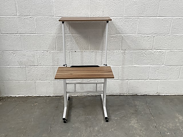 Adjustable height computer desk