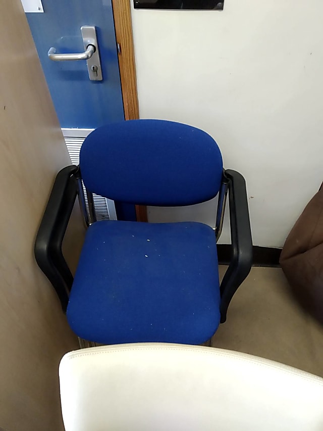 blue padded fabric armchairs with black frame