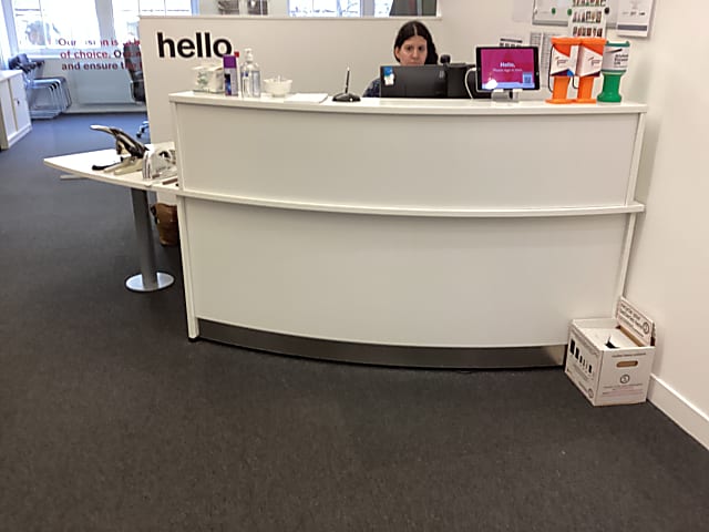 white custom built reception table