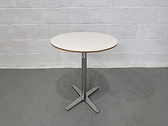 White top and silver base table by Materia