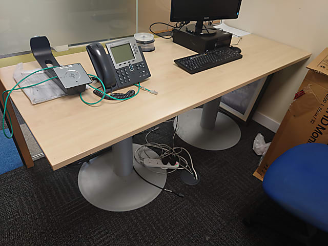 meeting room table with solid circular legs