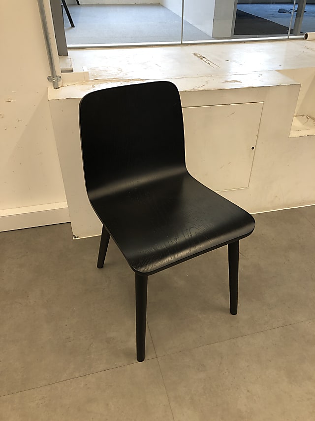 Small wooden designer chair