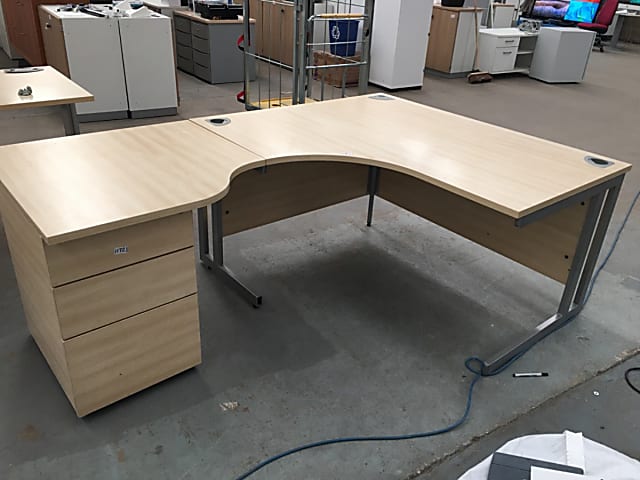 Corner desk with desk height pedestal extension