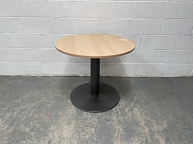 Round coffee table with black leg