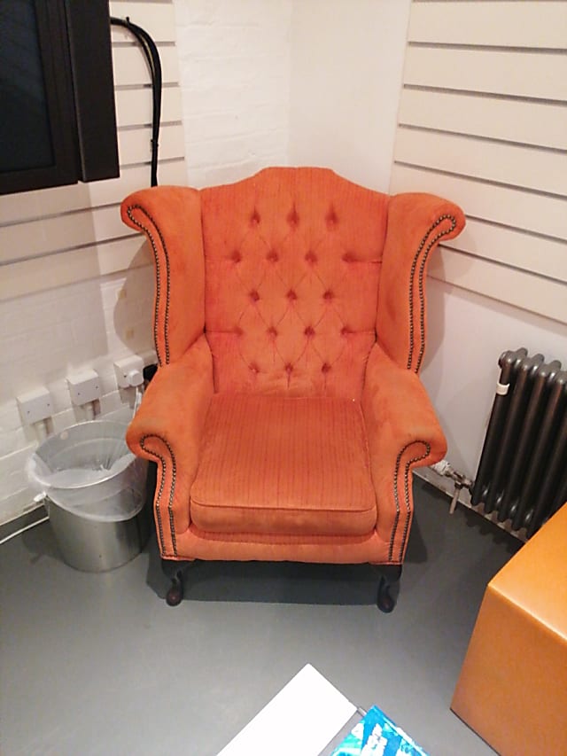 Fabulous orange padded armchair