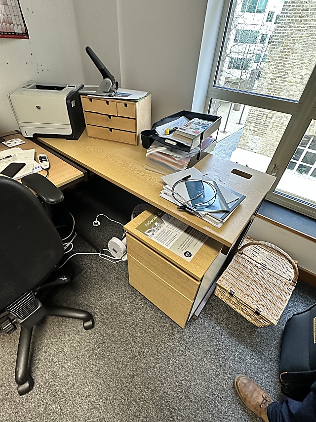 brown wooden desk with chair