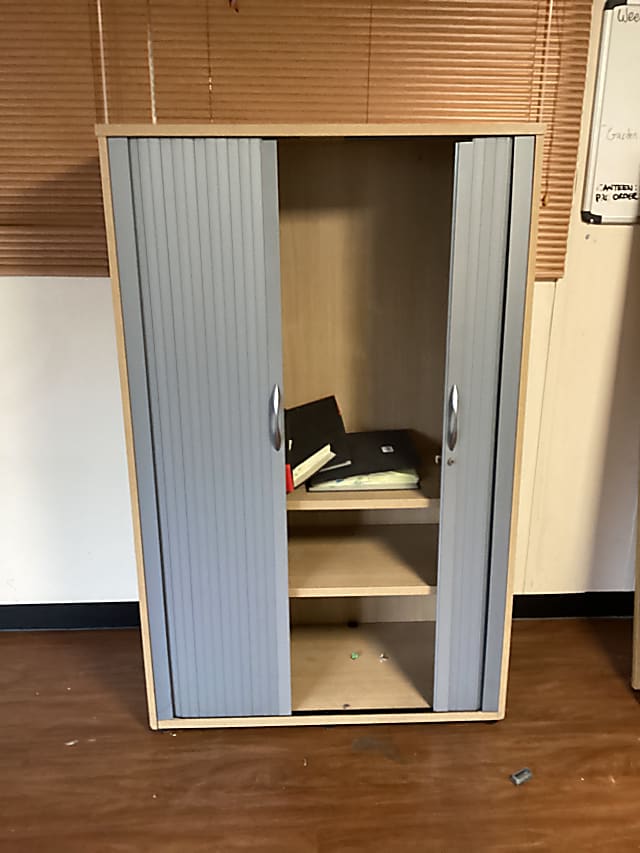 brown wooden TV hutch with flat screen television