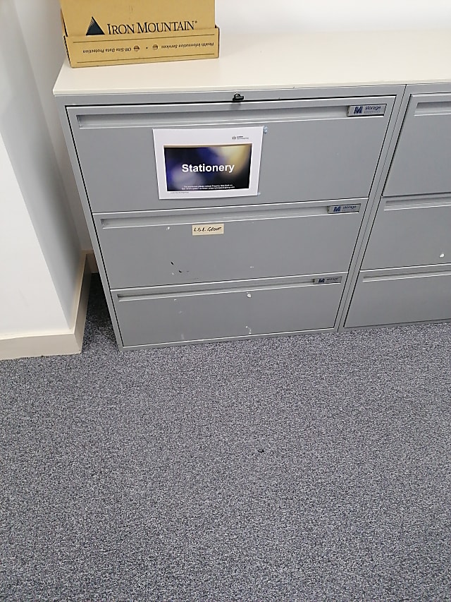 white metal 2-drawer filing cabinet